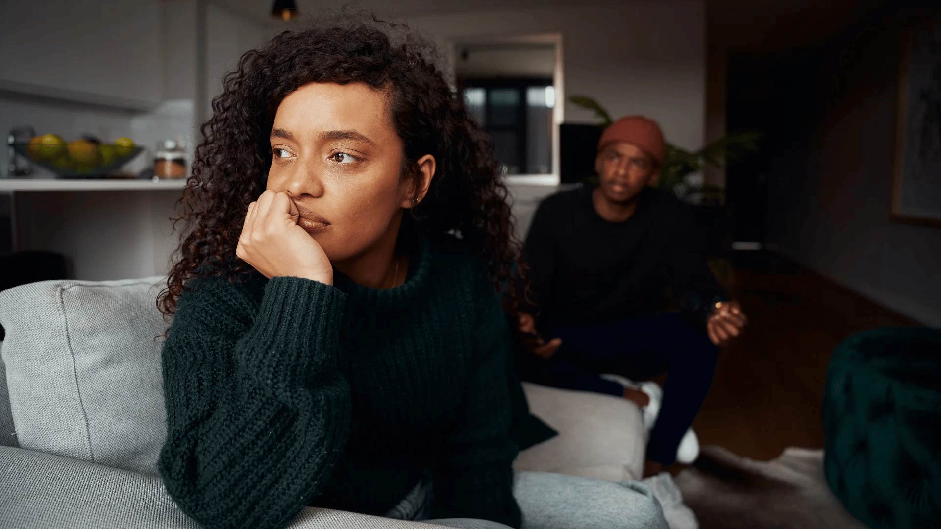 wife with a dismissive attitude ignoring her husband