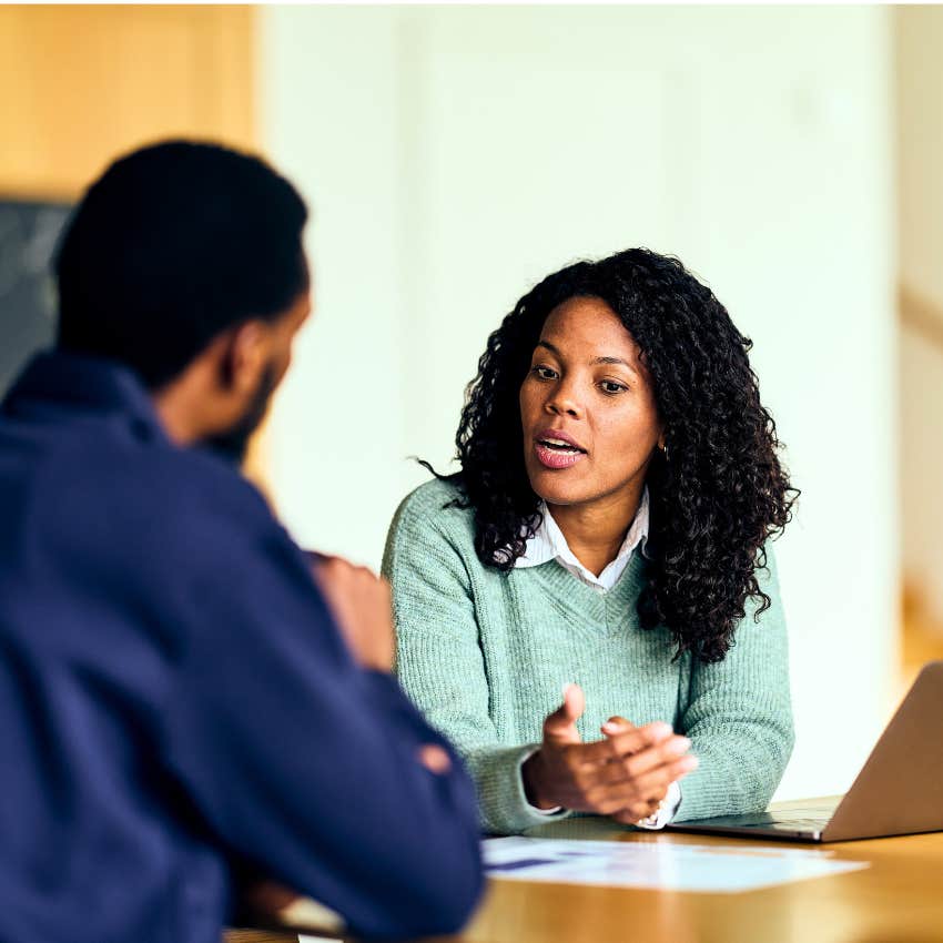 woman with high standards telling male colleague give me a second