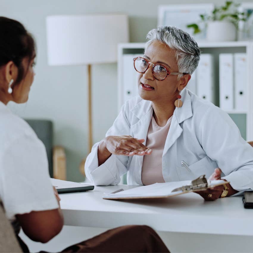 woman saying let me rephrase that to her client at work