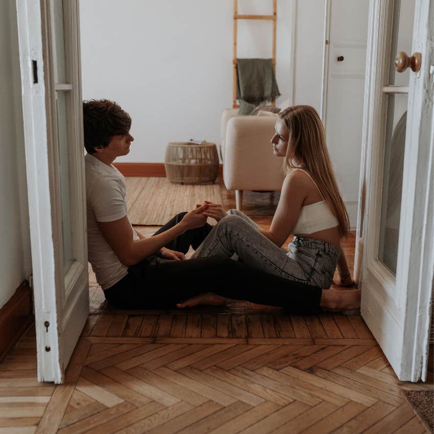 Woman thoughtfully evaluating her relationship with a man
