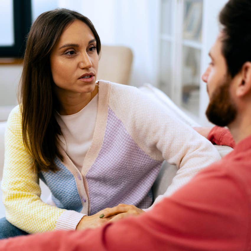 paranoid woman talking to partner saying why are you asking me that