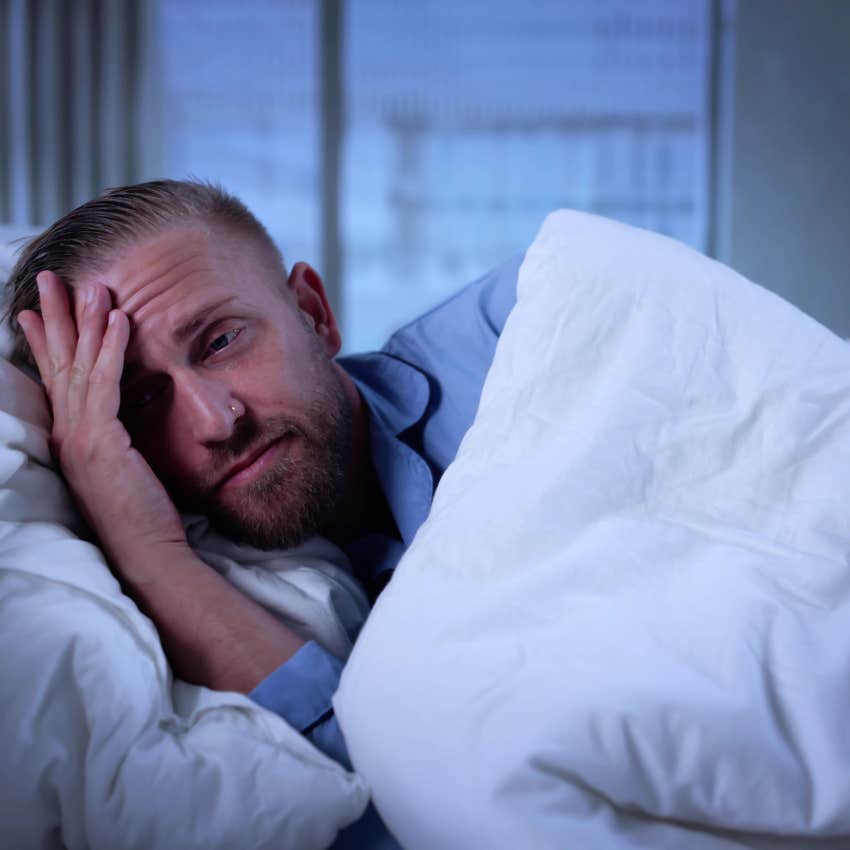 man worrying about not getting enough sleep
