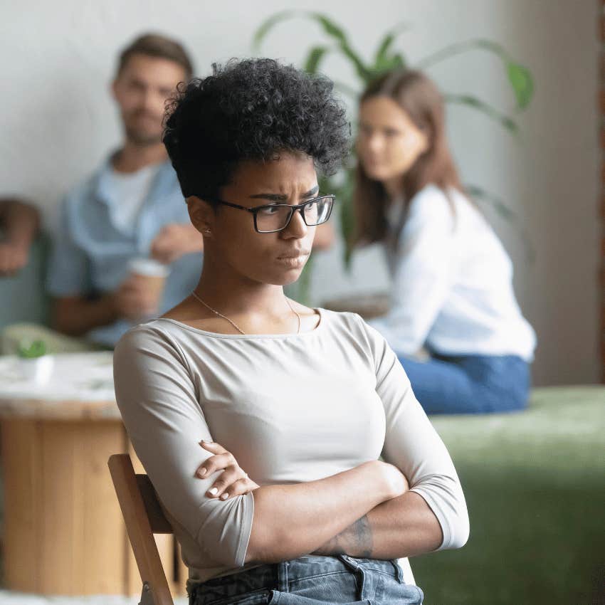 young woman being judged by others
