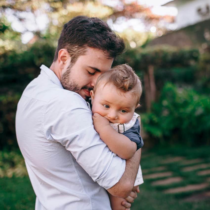 Dad giving affectionate touch to his daughter in a consistent way 
