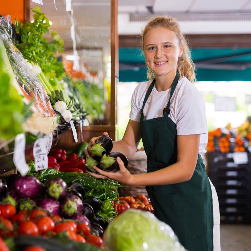 teen girl working at supermarket through high school learned responsibility and accountability
