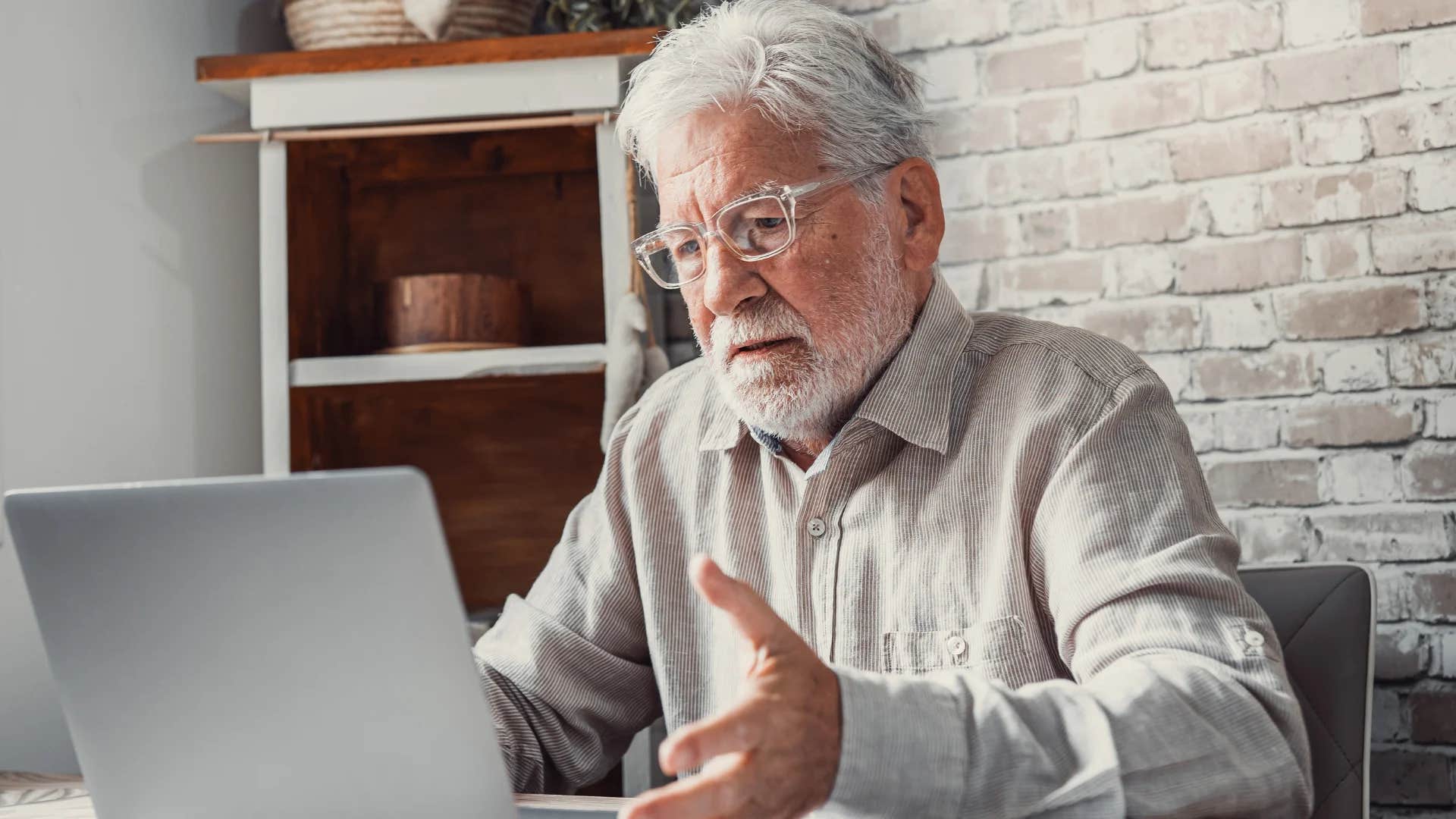 older man reacting to message that says i'm triggered