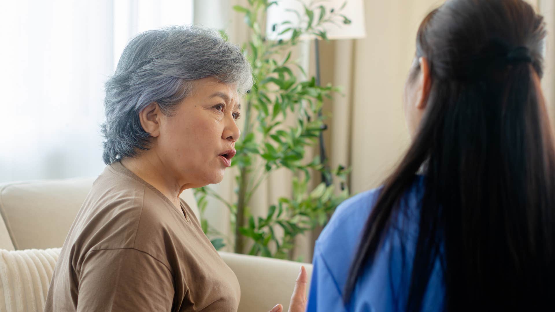 boomer mom telling her daughter she has a spending problem