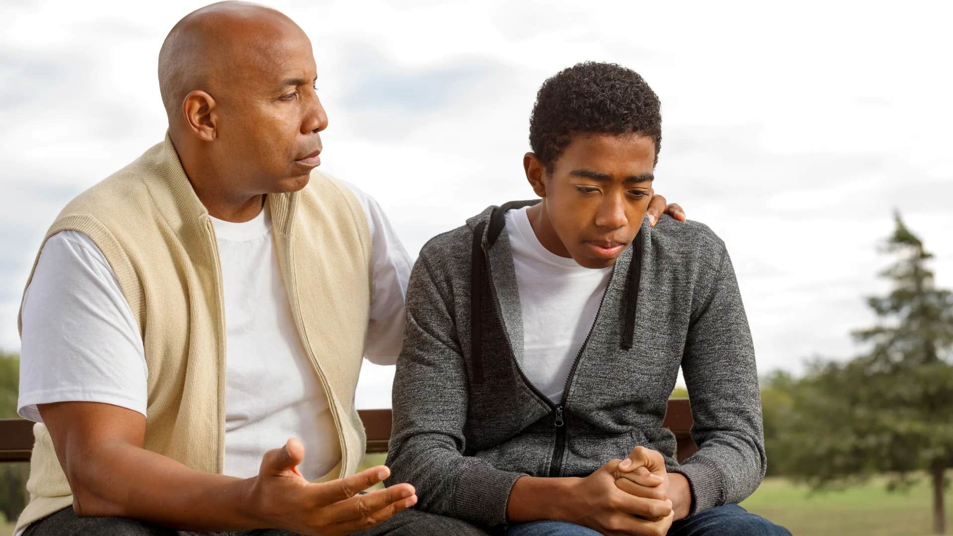 young man asking older man could i have some help