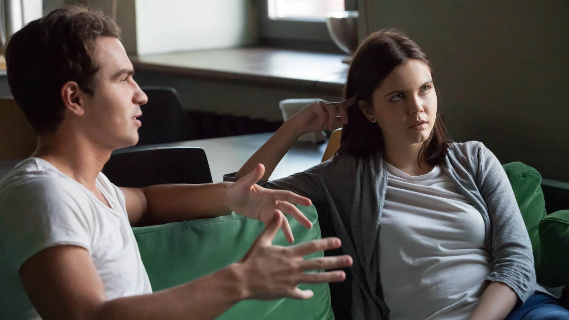 woman rolling her eyes at manipulative man saying do what you think is right