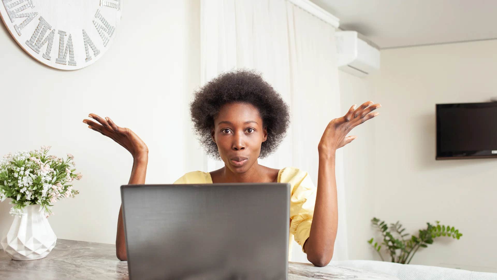 woman shrugging saying i don't have enough information to be of assistance