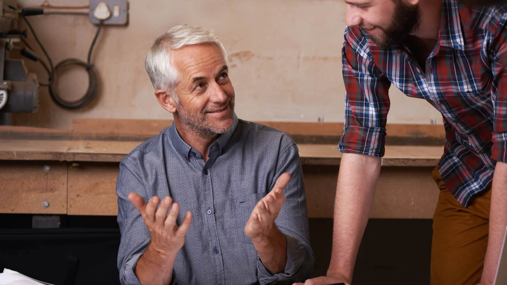 man telling coworker saying i don't want to give you inaccurate information