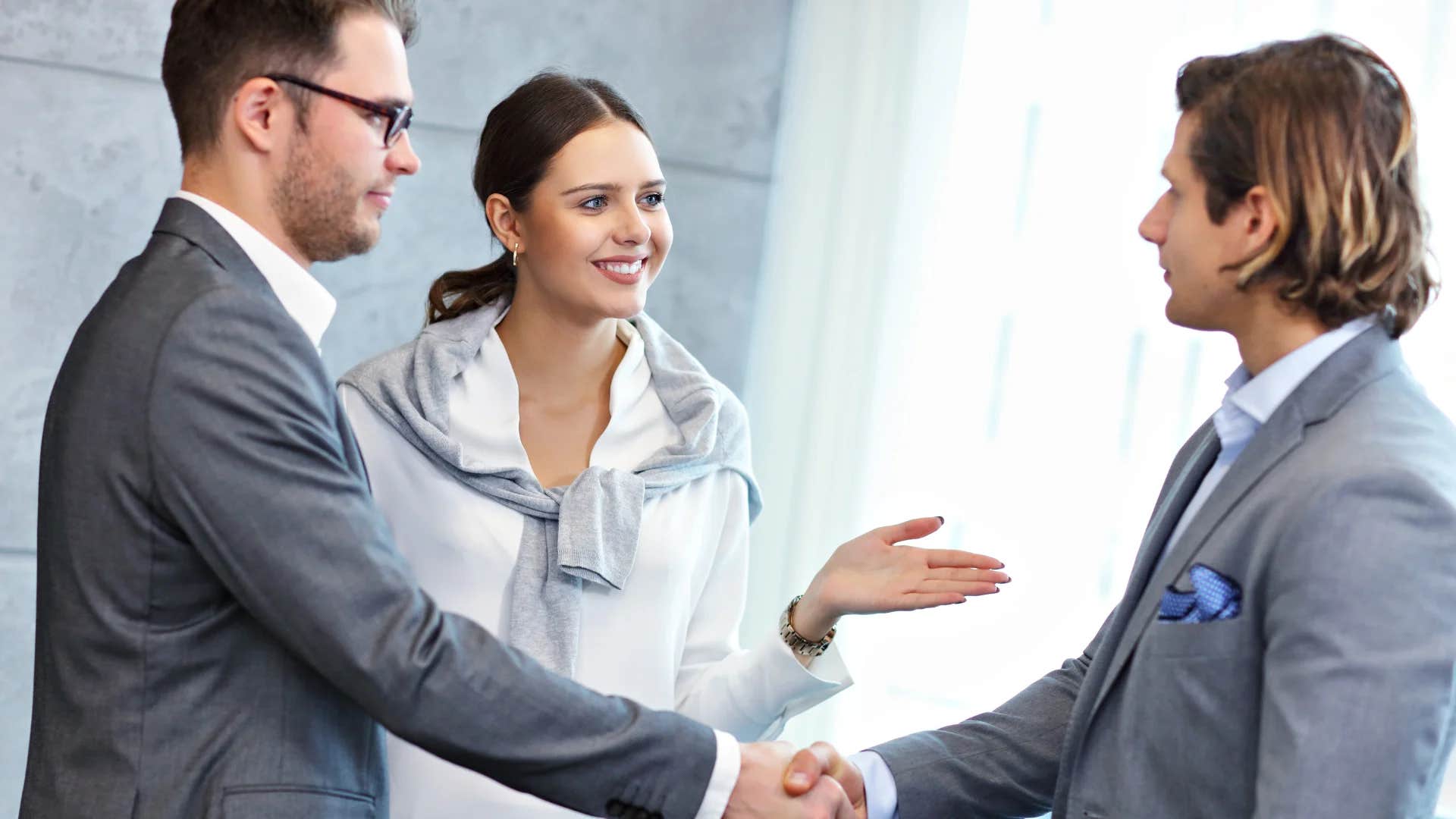 woman asking colleague have you had a chance to loop them in