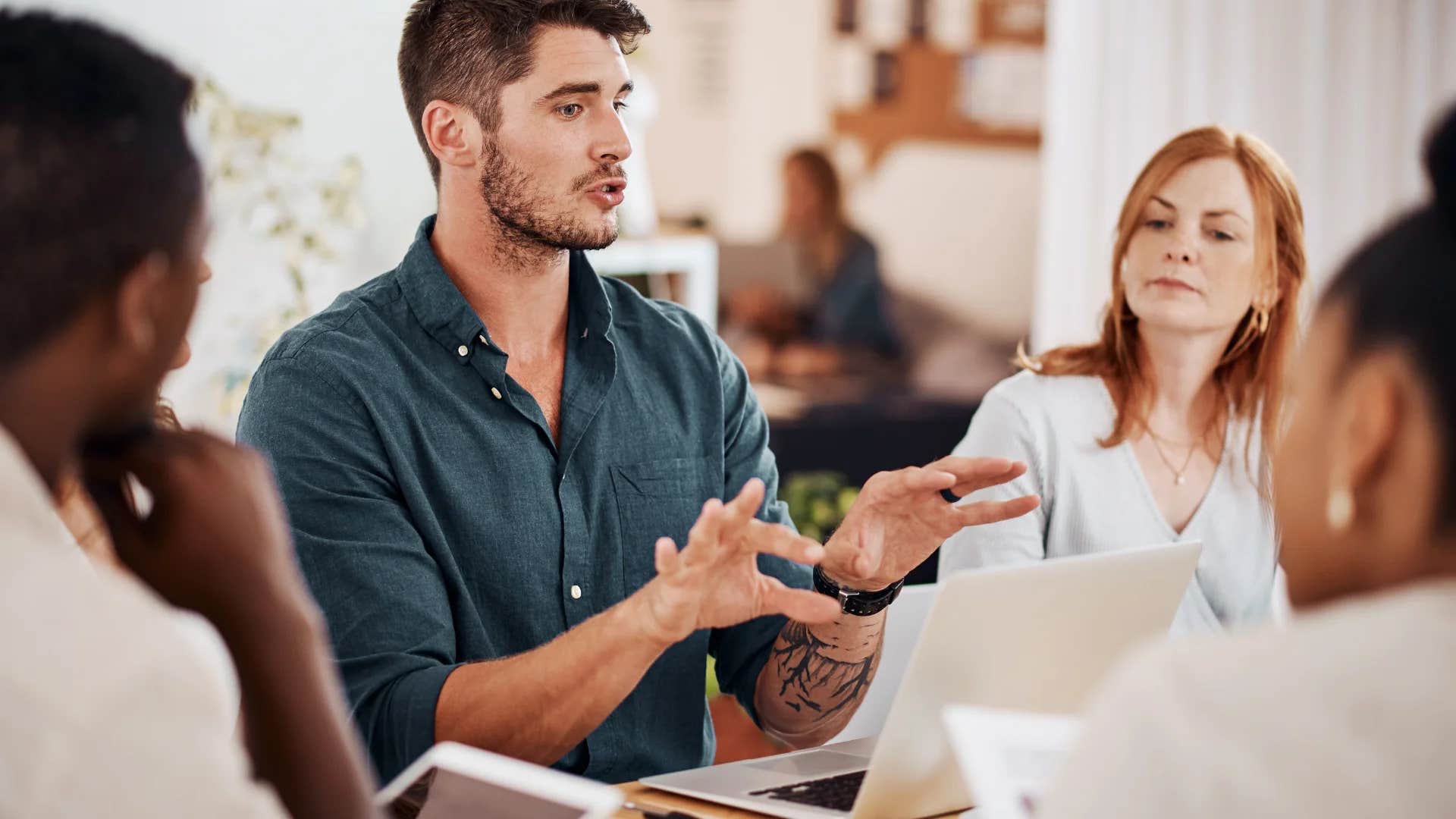 man telling team let me see if that aligns with our team's objectives