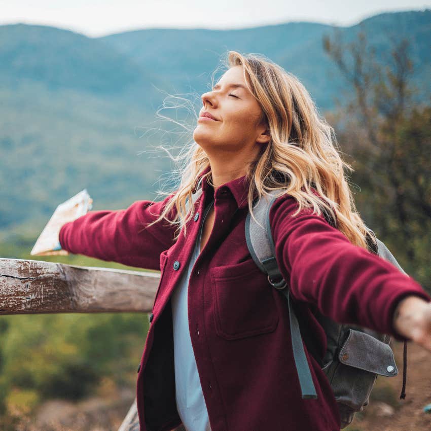 calm woman spending time in nature