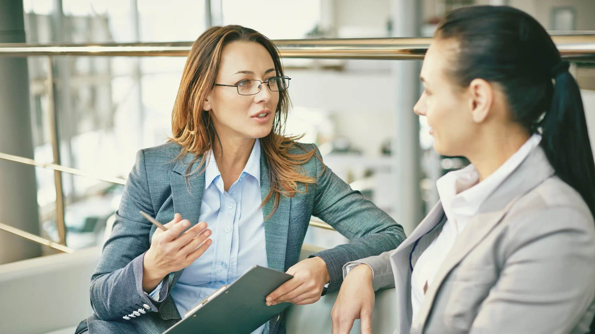 woman telling colleague it's not always about having the right answer it's about asking the right questions