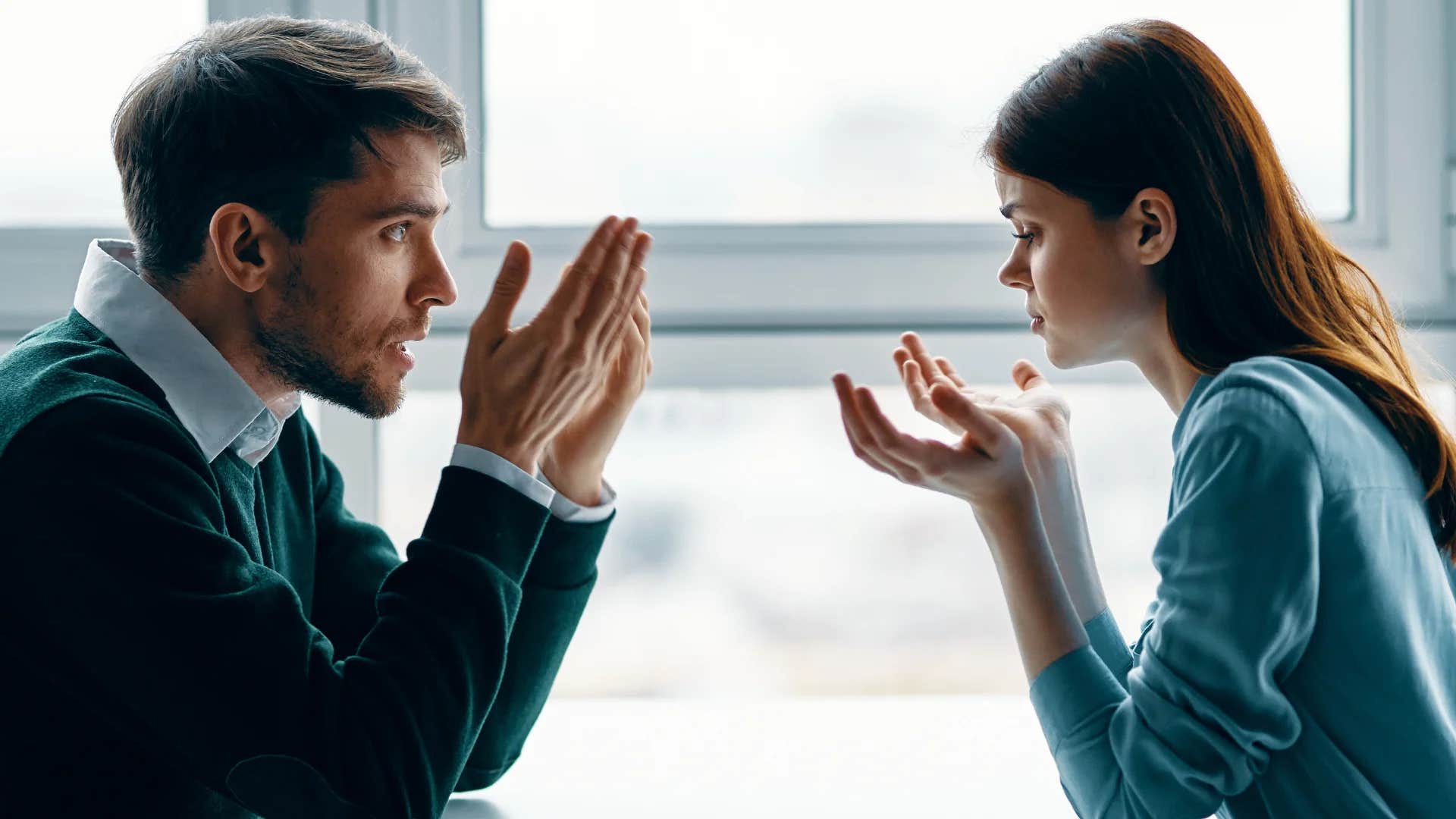 unhappy man telling woman to do whatever you want