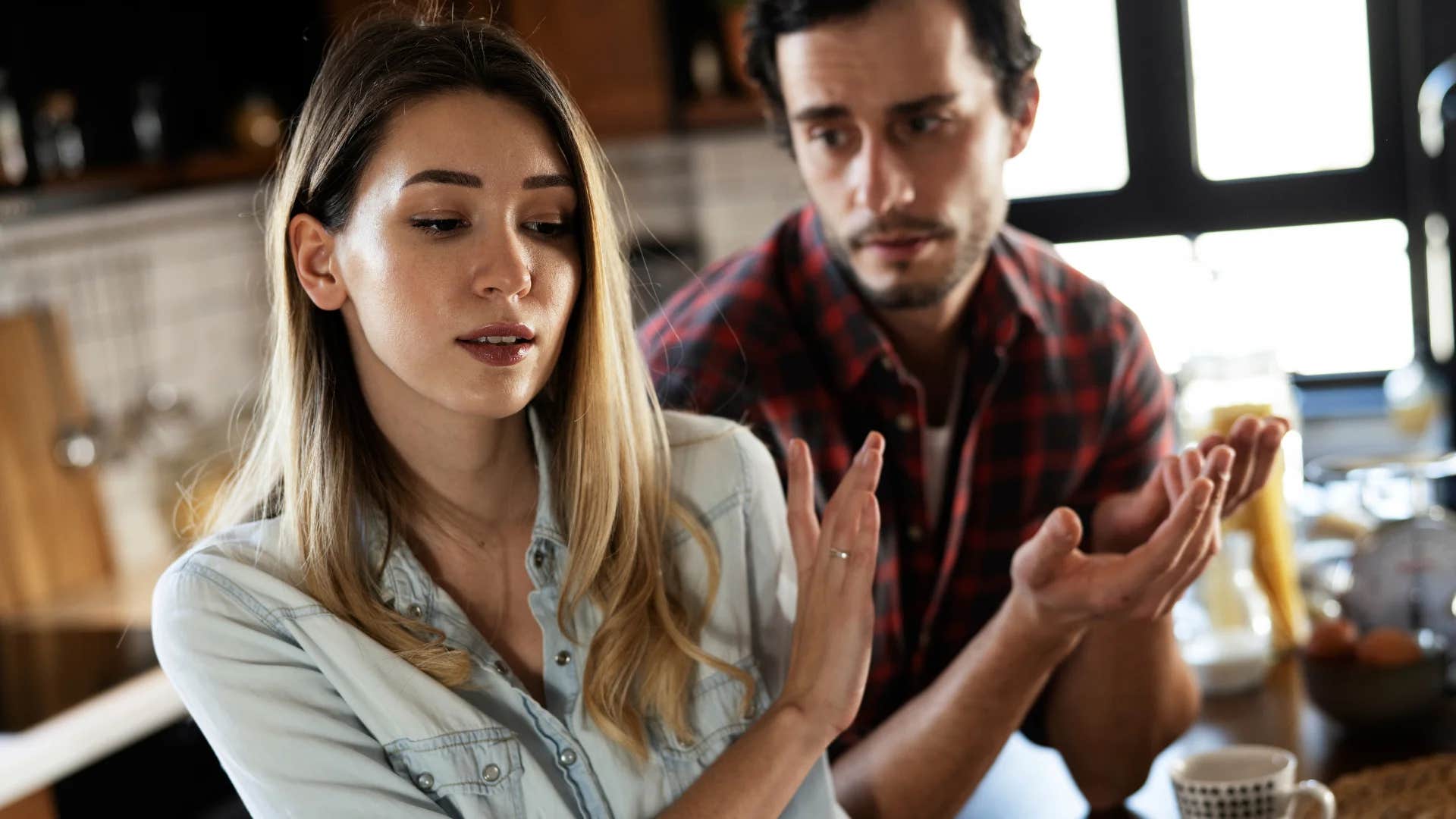 unhappy husband telling woman i'm tired of fighting