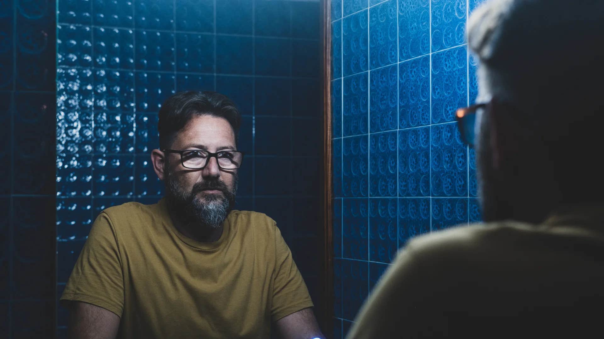 unhappy man telling himself i'm not good enough