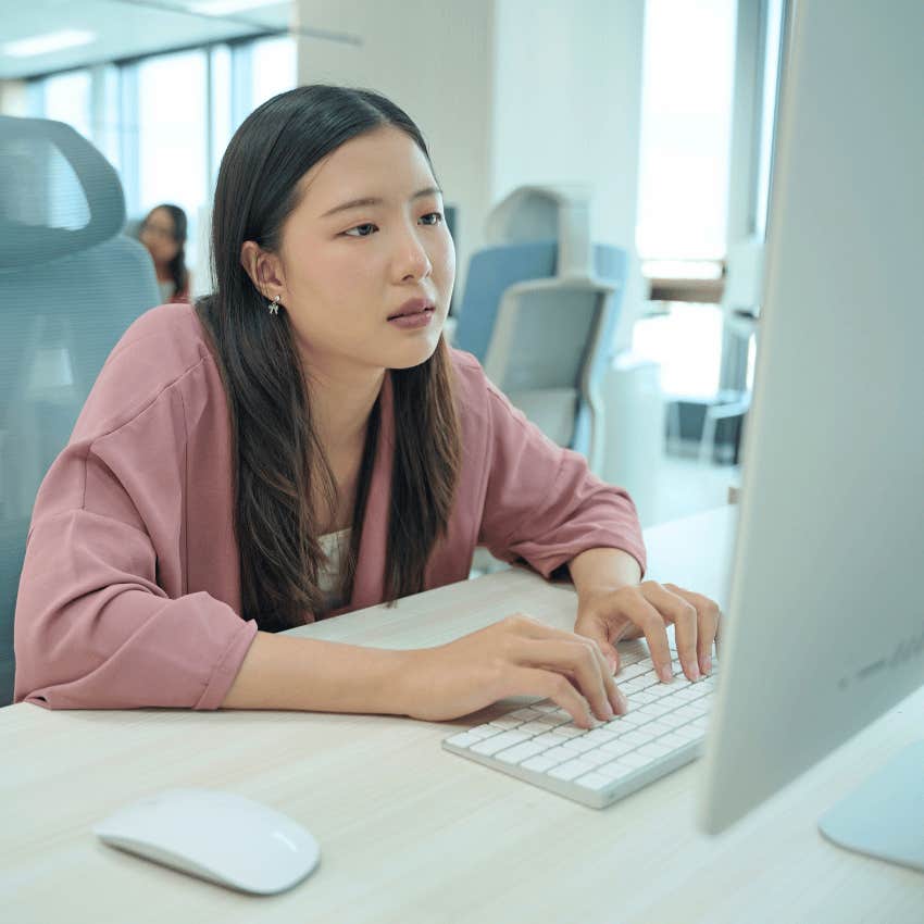 woman sending email that says i'm just writing to