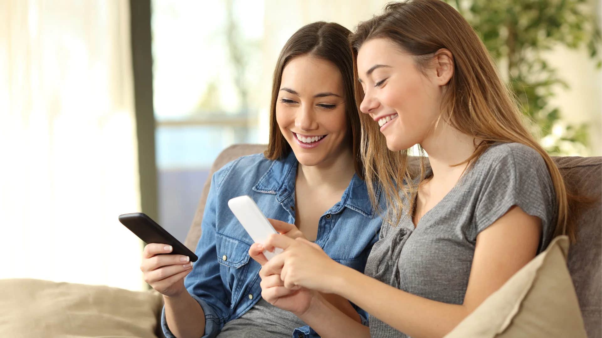 two women exchanging name and numbers to keep in contact