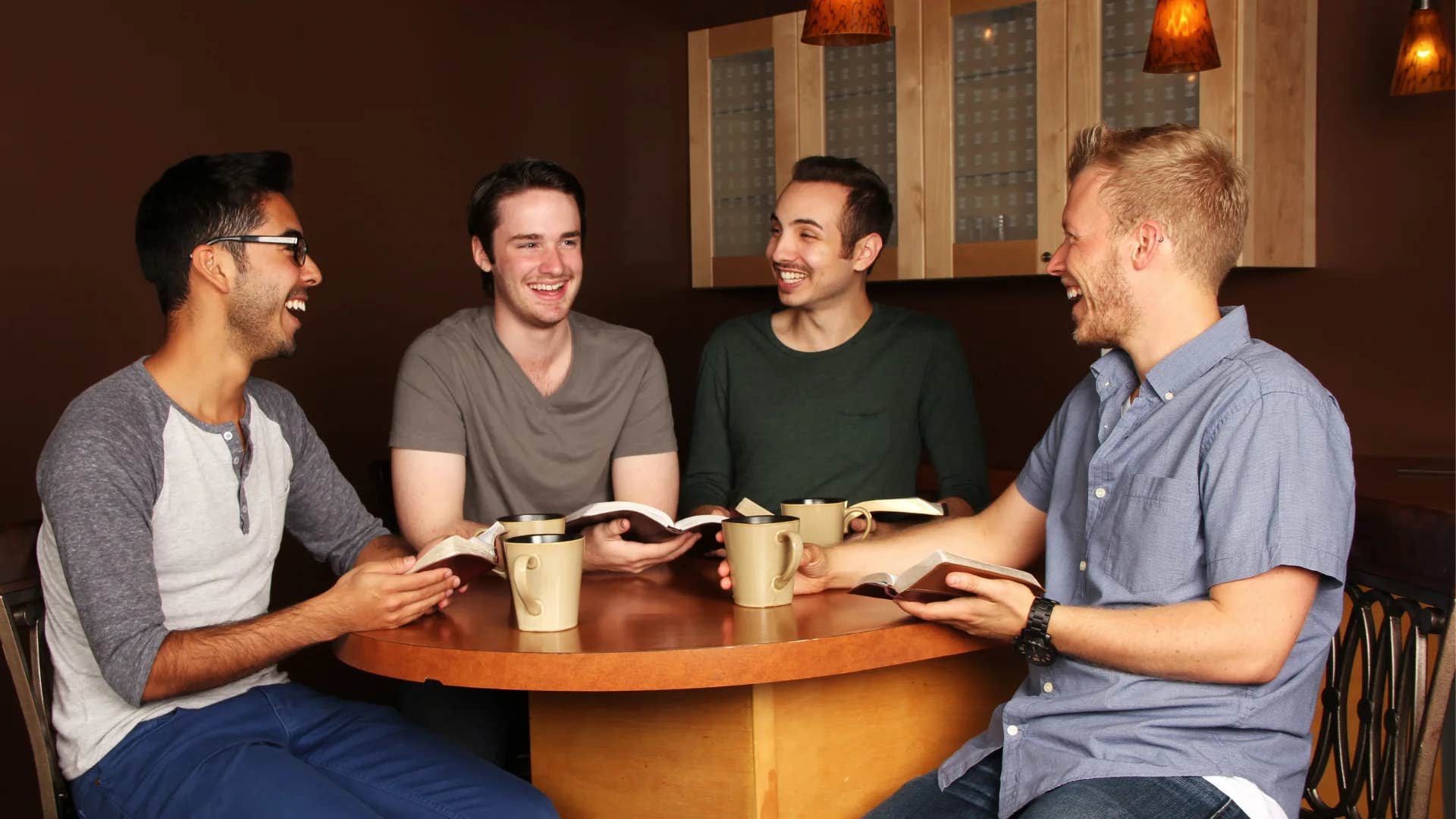 man telling friends there's someone they want them to meet