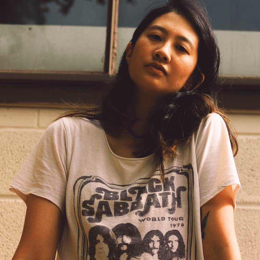 gen-x woman wearing vintage band tee
