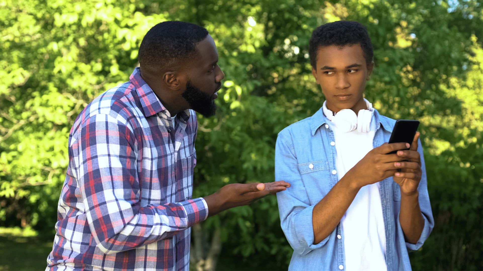 older man telling younger man that he'll find something for him to do