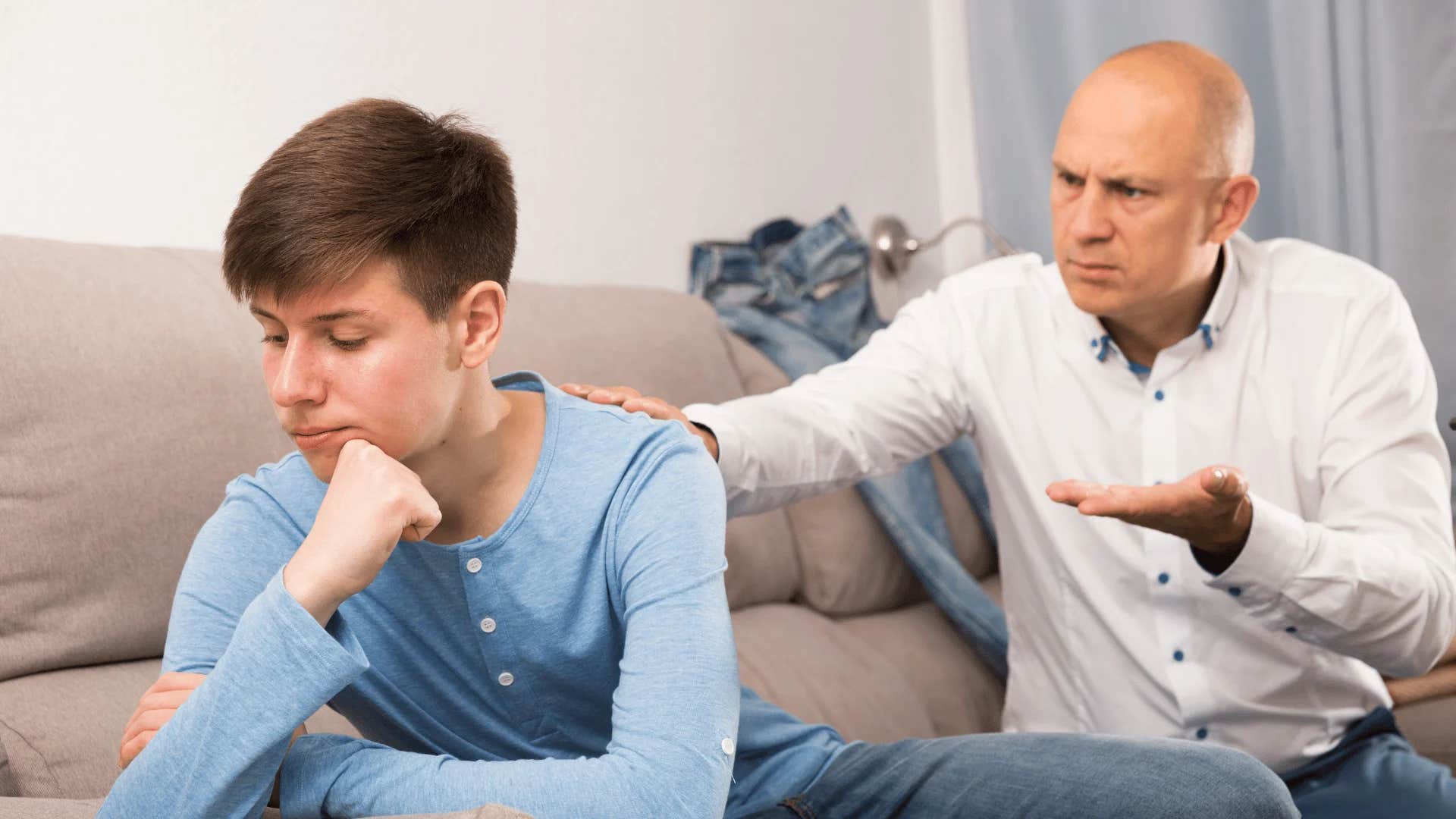 man telling teenage boy there are kids starving out there and you're worried about this