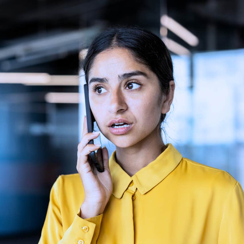 Gen Z woman annoyed answering unexpected phone call