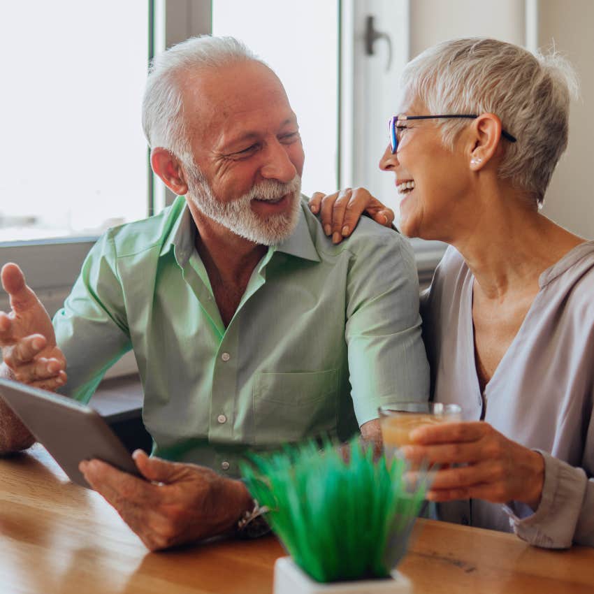 happy boomer couple at home