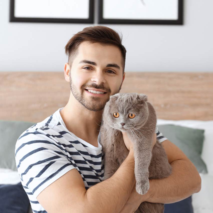 happy millennial man at home