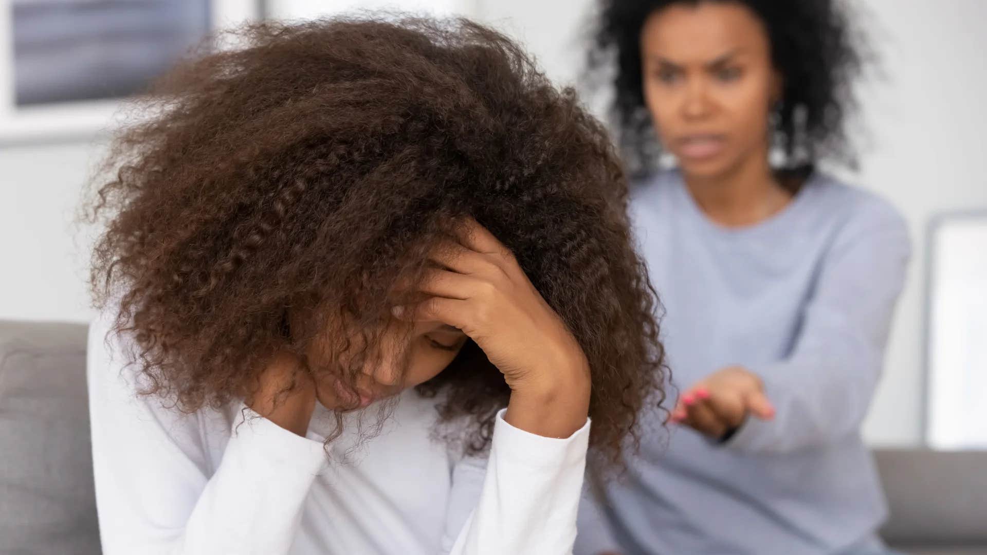 teenage girl being told to stop crying or i'll give you something to cry about