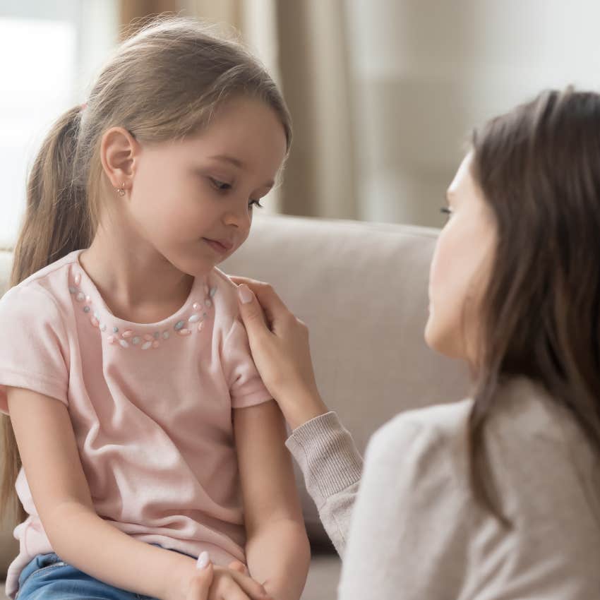 girl being criticized by her parent