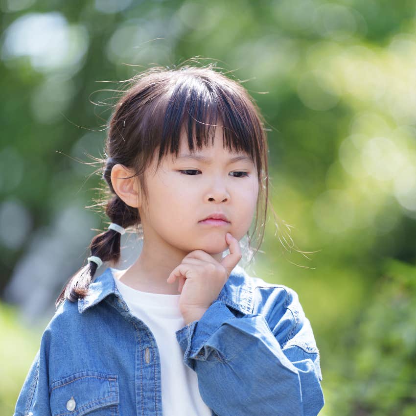 little girl thinking about what she wants and struggling to set boundaries because she was raised with too many choices