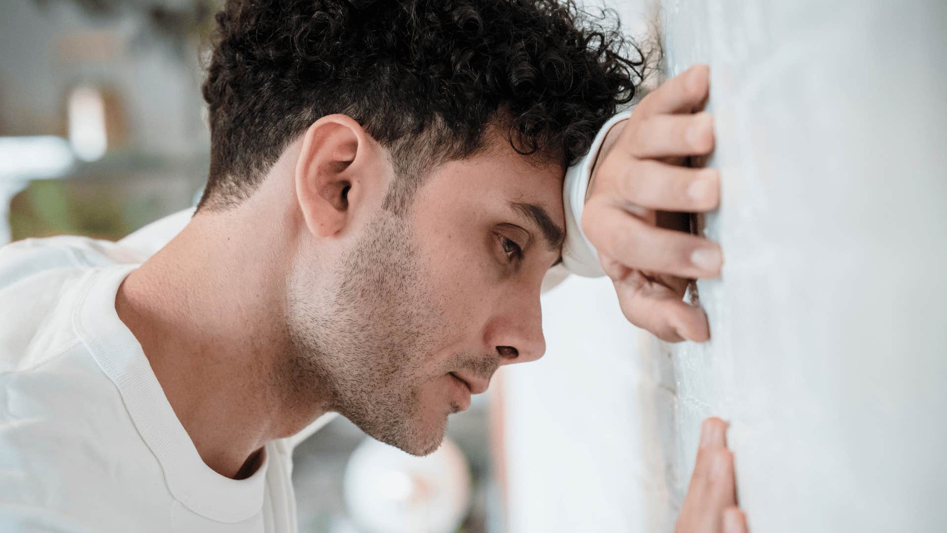 man feeling guilty after enforcing his boundaries with friends