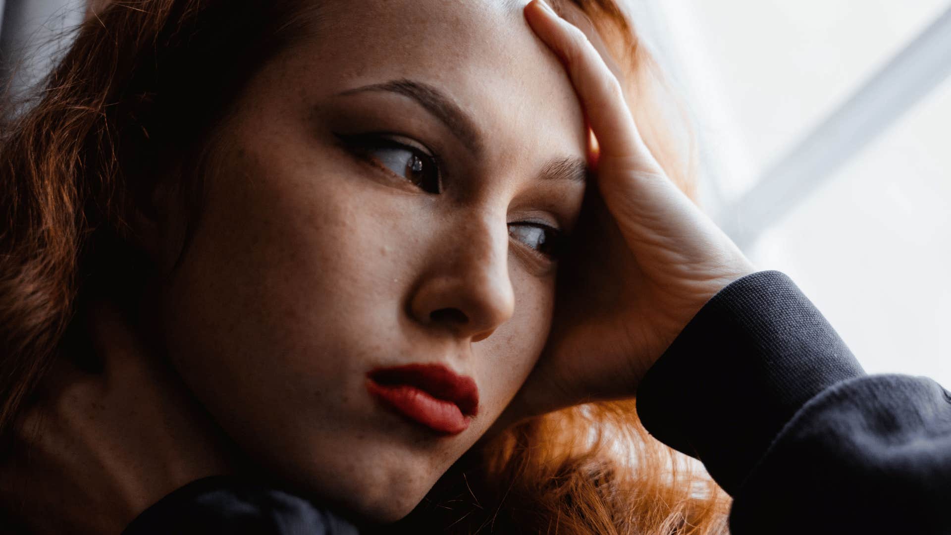woman stressed from her perfectionist tendencies