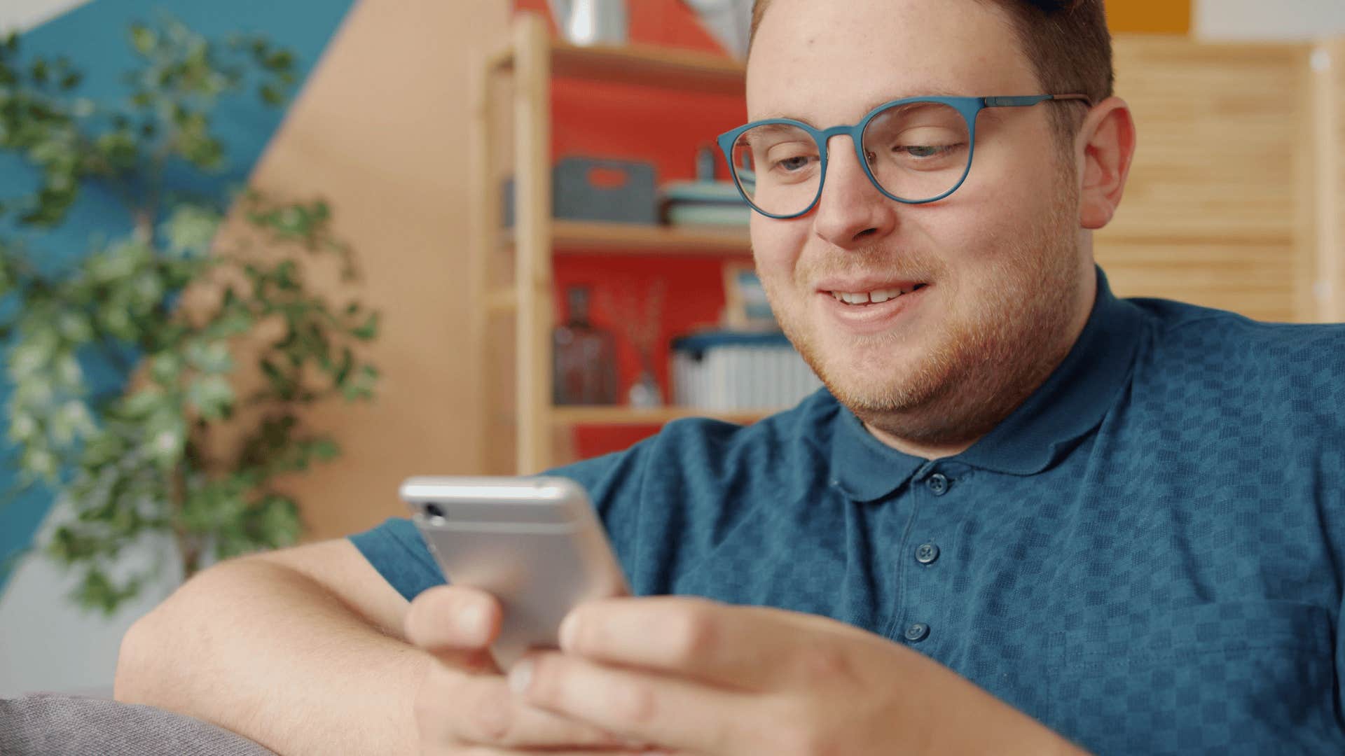 man continuously scrolling on his phone excessively using social media