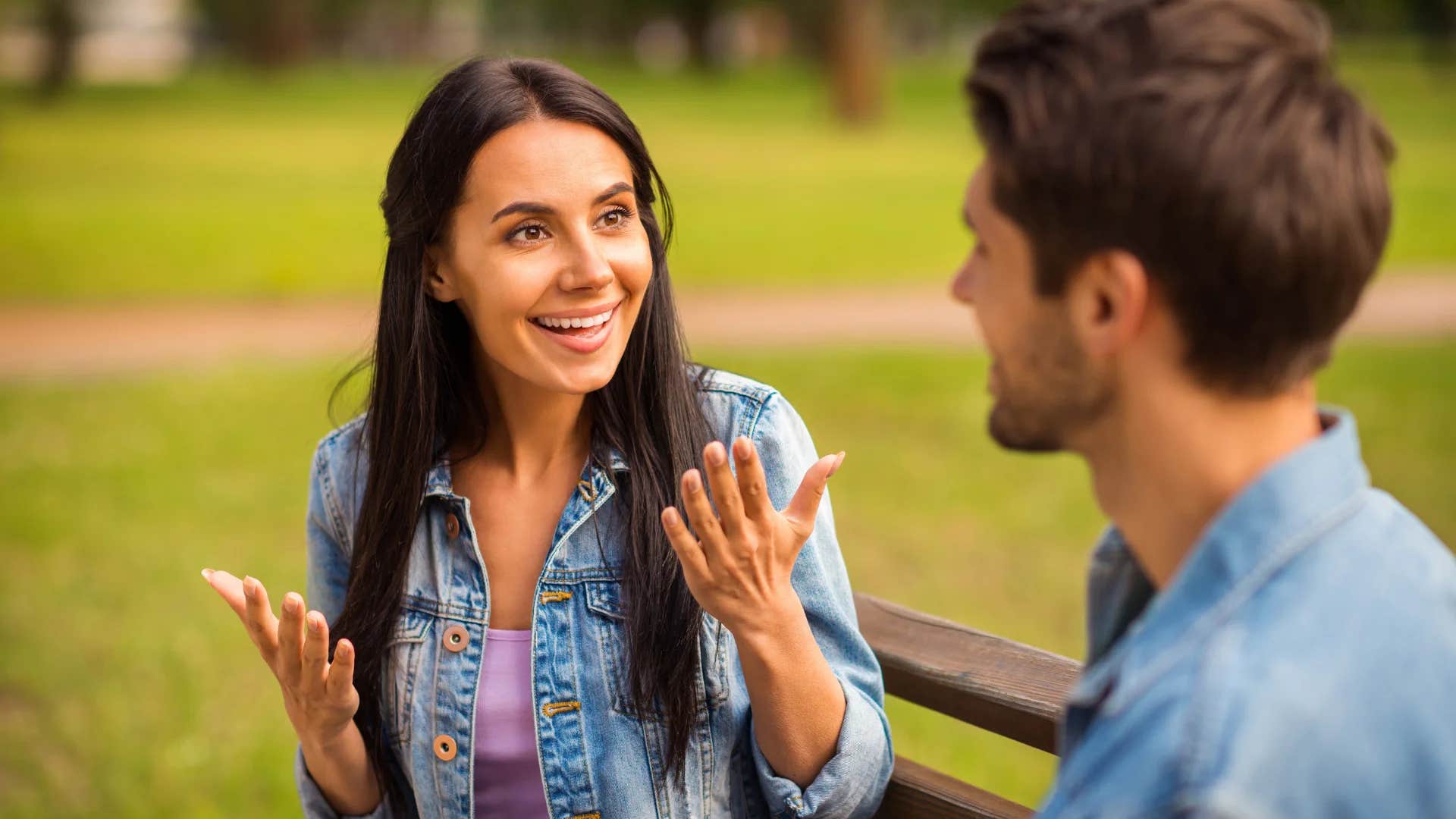 woman trying to one-up her friend in conversation