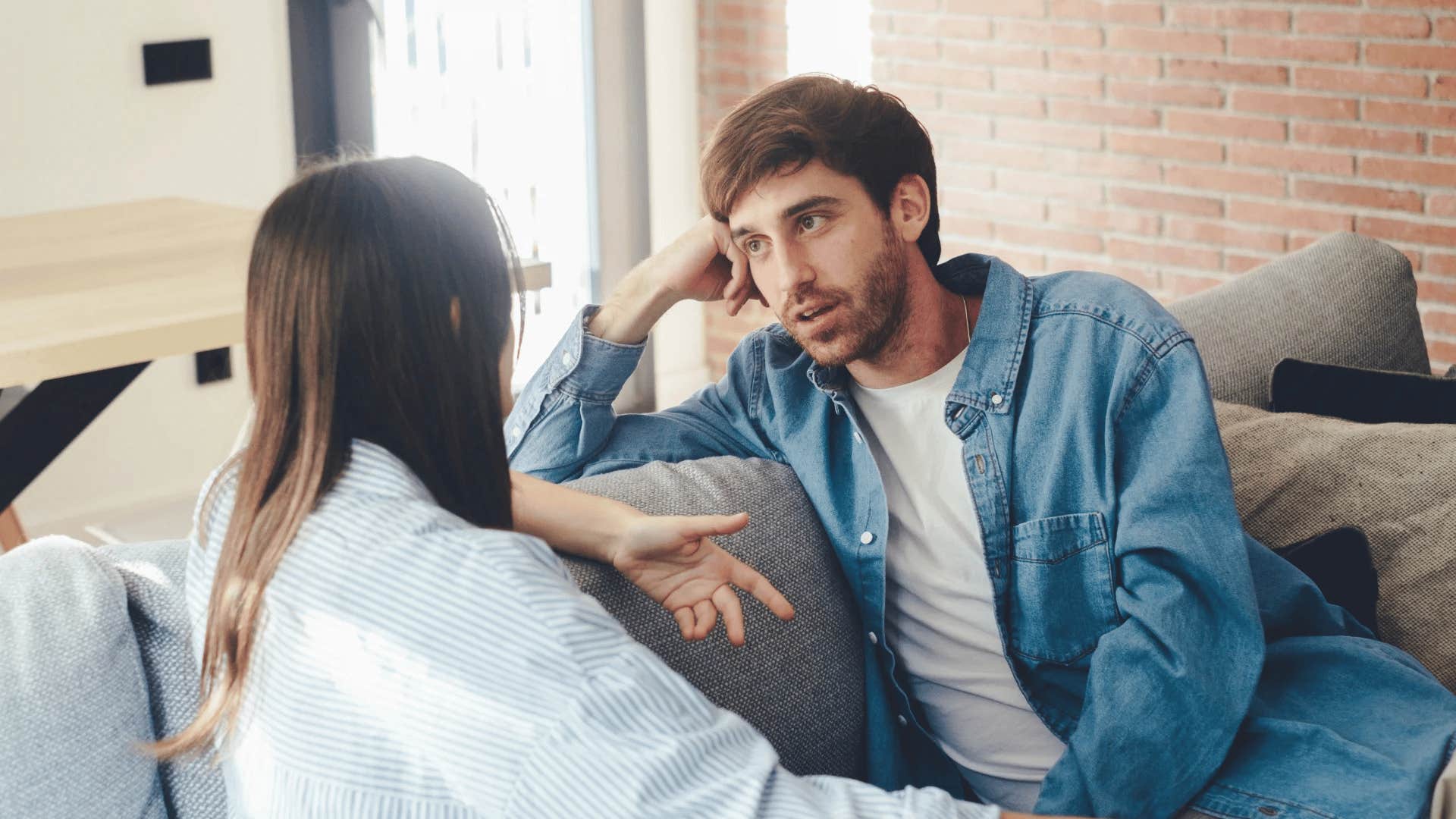 man playing the victim in conversation with partner