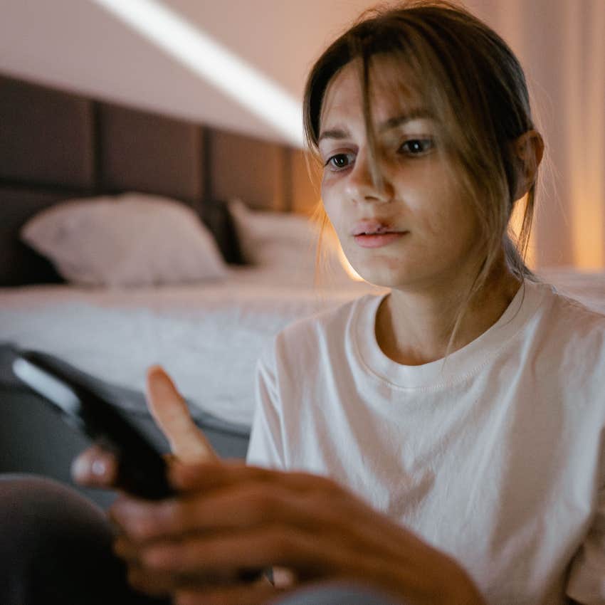 woman going through a tough time canceling plans via text