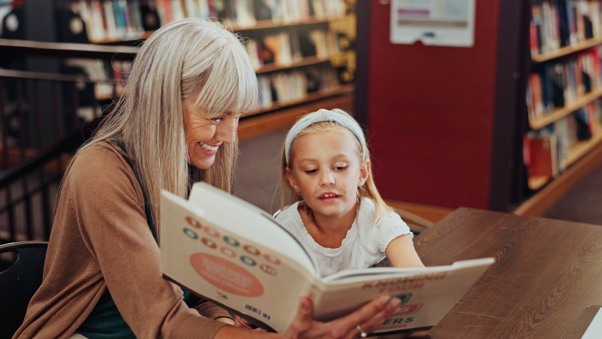 retired introvert grandma on an outing to the library with granddaughter
