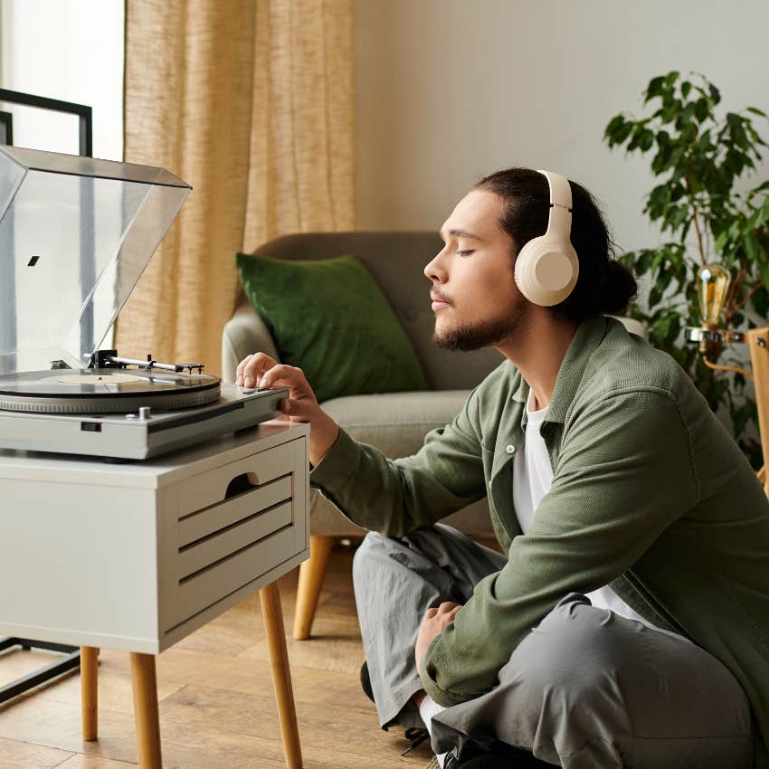 man who feel fulfilled in life enjoying listening to music as a hobby