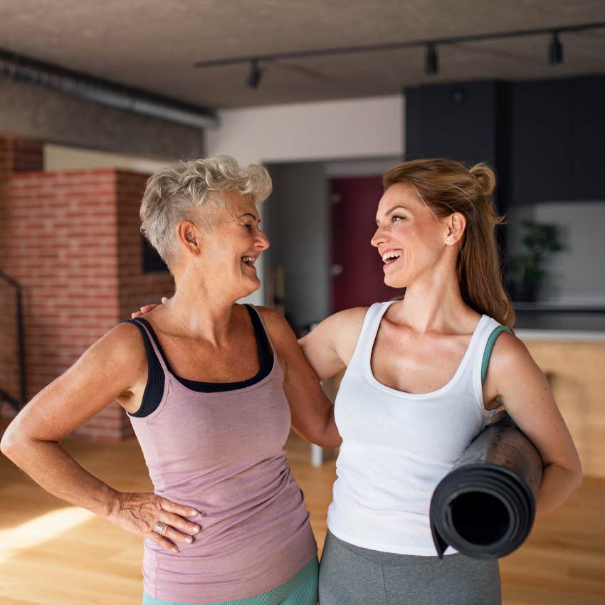 women who feel fulfilled in life chatting after yoga class