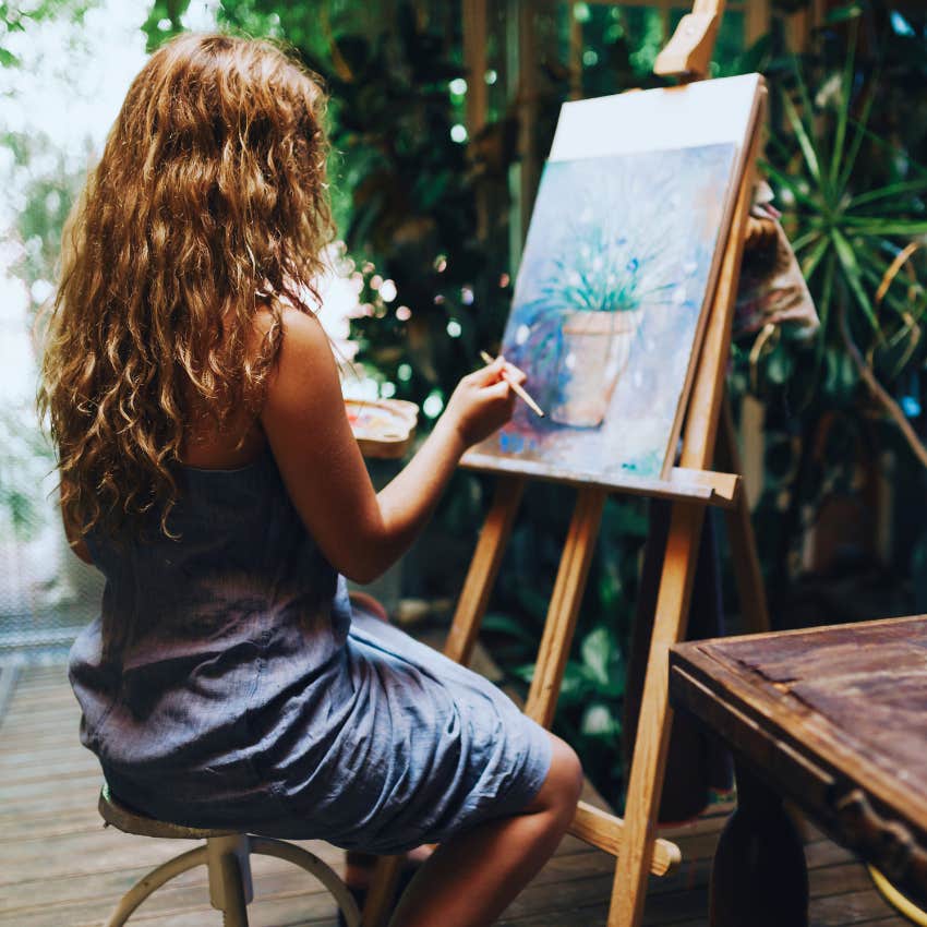 high vibe woman creating visual art