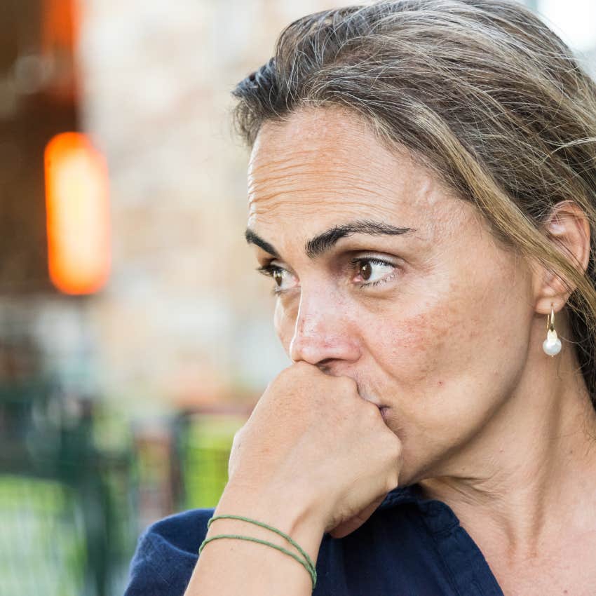 woman who minimizes her feelings because she was raised by emotionally exhausted parents