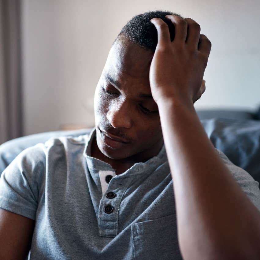 sad man dismissing his own needs at home