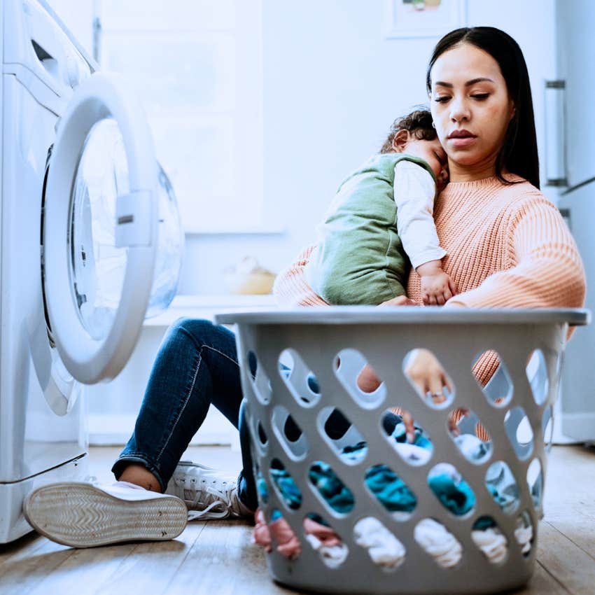Woman saying "I can't leave it like this" at home doing laundry.
