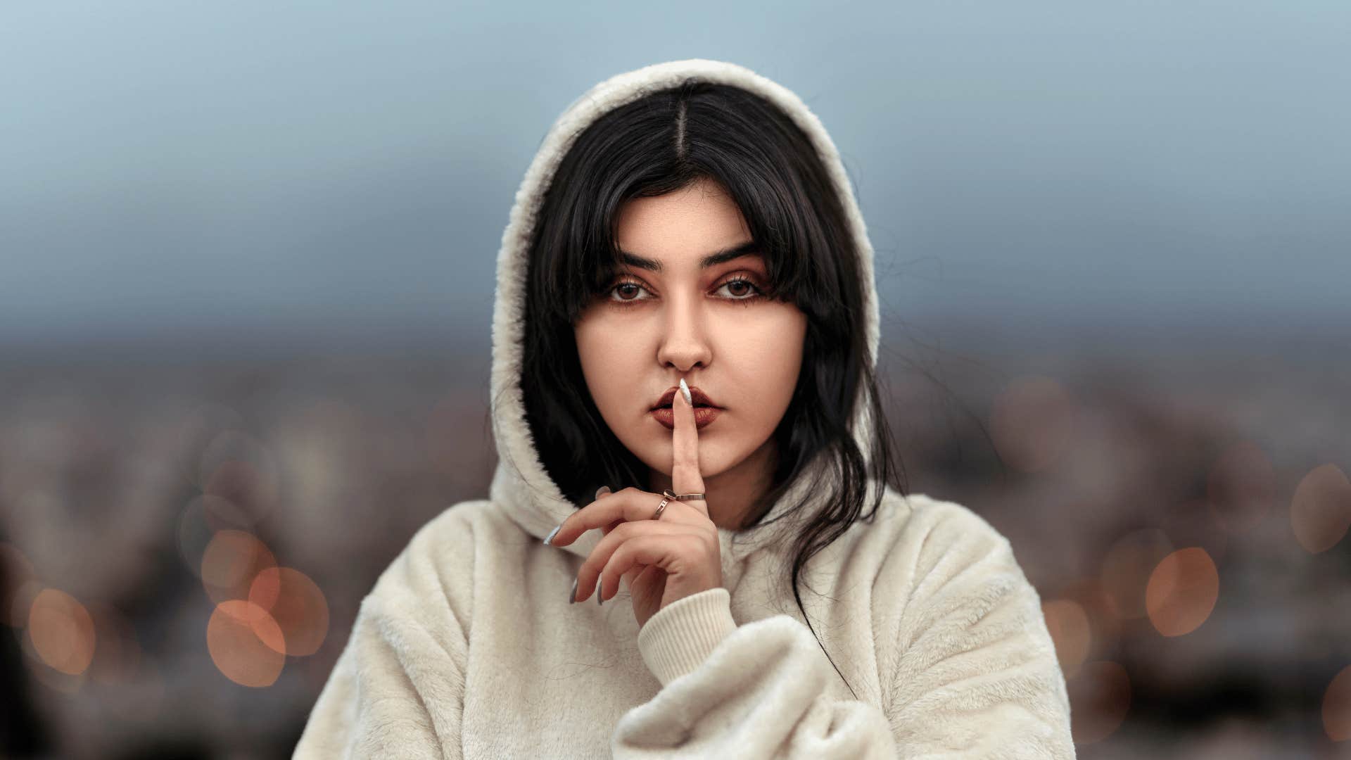 woman raised by nosy parents who keeps everything to herself