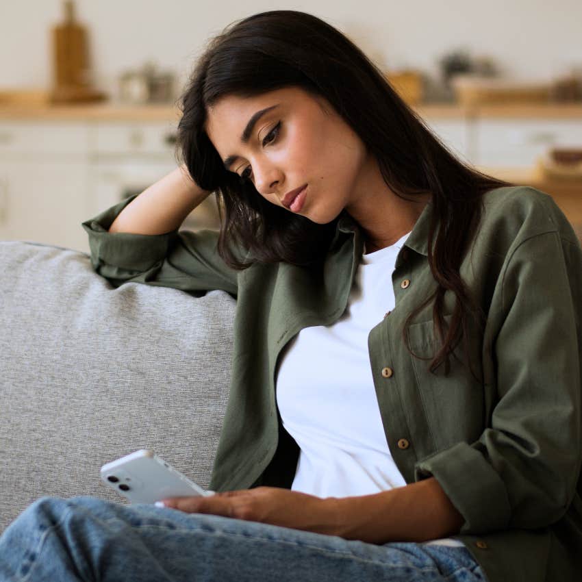 sad woman avoiding her concerns sitting alone at home
