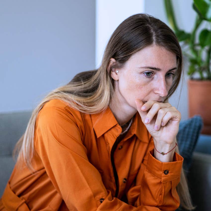 woman hiding her complex feelings deep in thought